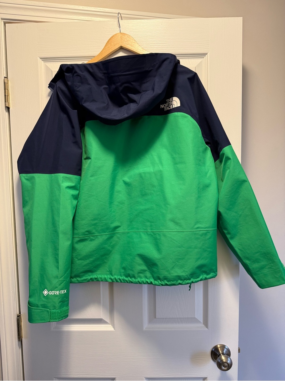 The North Face Green Jacket with Navy Shoulders and Hood - Picture 2 of 2